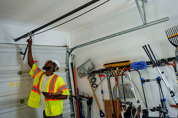 Professional Garage Door Roller Replacement technician working in Le Claire, IA
